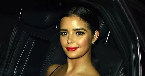 Demi Rose Mawby Flashes Major Cleavage In Dangerously Low Cut Black Dress At London Shop Launch