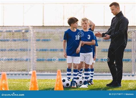 Soccer Coach Motivating Kids On Training Young Coach With Kids In
