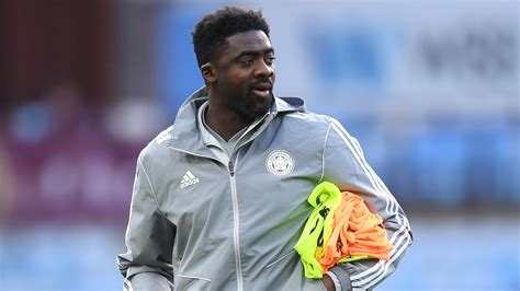 former arsenal defender kolo toure takes wigan athletic job as he begins his managerial career
