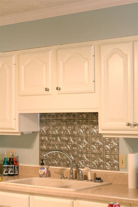 Apply a deglosser, then wipe it off with a clean rag. our new faux tin backsplash and newly painted cabinets and walls | Tin backsplash kitchen ...