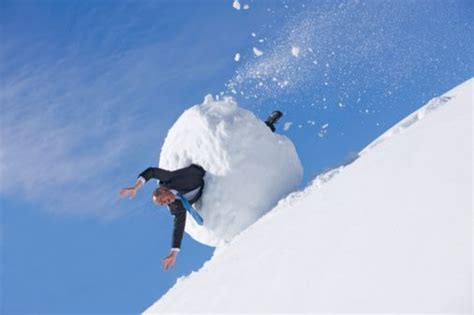 Businessman Rolling Downhill In Huge Snowball Snowball Debt Snowball