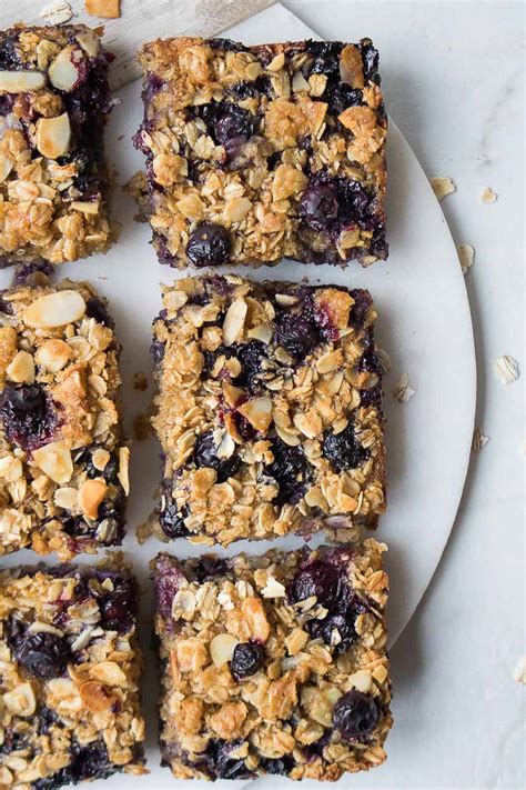 Beat in milk, butter, maple syrup, eggs, and vanilla extract; Blueberry Baked Oatmeal Bars (Healthy!) - Stephanie Kay ...
