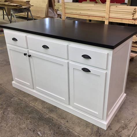How doers get more done. Item #148 Custom kitchen Island with Seating and Storage ...