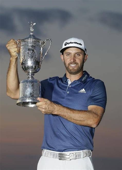Dustin Johnson Holds The Trophy After Winning The Us Open Golf