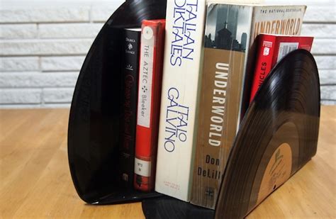 To make bookends like the one in these photos you'll need a sheet of plywood, screws, a drill, a jigway, paint and spray polyurethane. How to Make Vinyl-Record Bookends Without Burning Yourself | DIY Crafts | Groupon