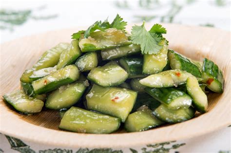 Chinese Smashed Cucumbers With Sesame Oil And Garlic Recipe Nyt Cooking
