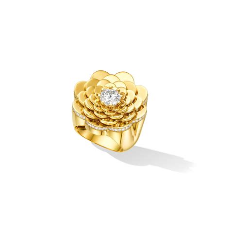 Petals Of 18K Yellow Gold Open In Full Bloom To Reveal The Impeccable