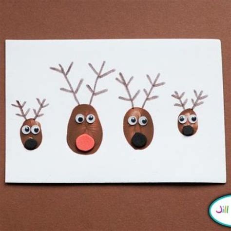 Three Reindeer Faces Are Shown On A Card