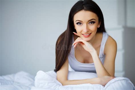 Happy Morning Portrait Of A Smiling Pretty Young Brunette Woman Stock