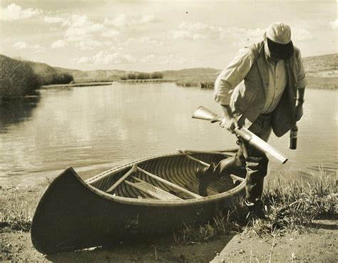 Ernest Hemingway Stepping Out Of A Canoe Sun Valley Idaho October