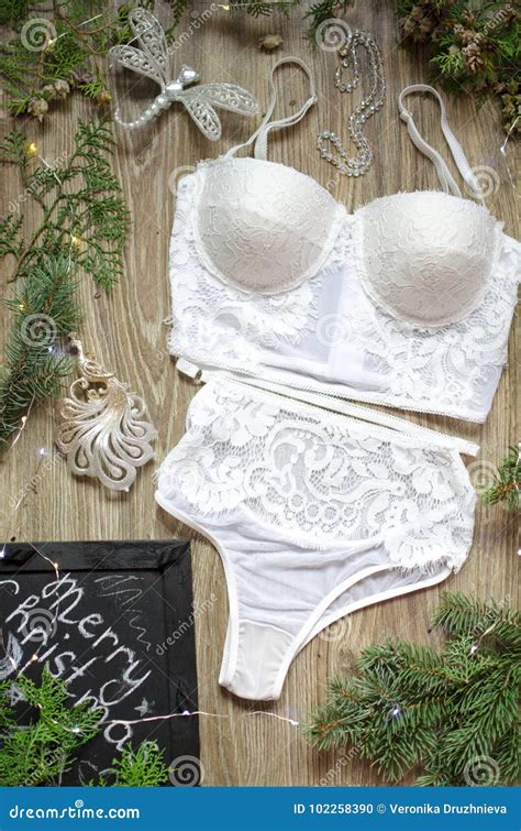 fashion push up bra and panties set on the wooden festive background merry christmas t for