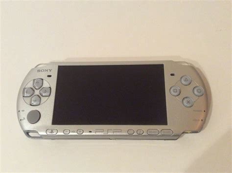 Sony Psp 3000 Portable Mystic Silver With 2 Games Icommerce On Web
