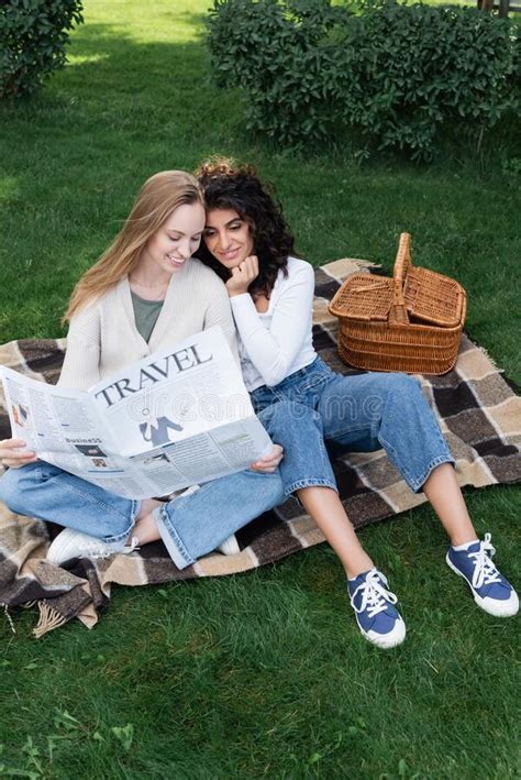 Happy Lesbian Couple Reading Travel Newspaper Stock Image Image Of Couple Women