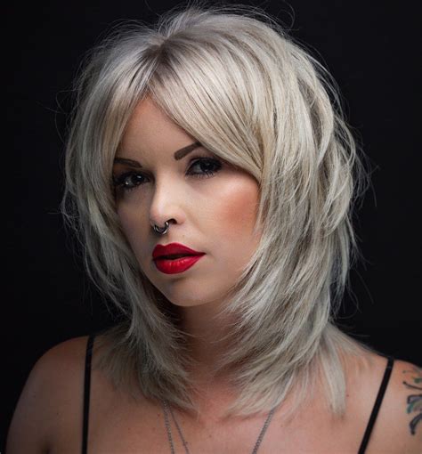 20 Collection Of Edgy Platinum Feathered Shag Haircuts