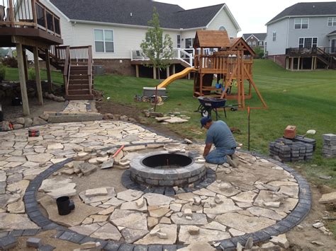 Construction Of Canadian Flagstone Patio With Brick Paver Accent Brick