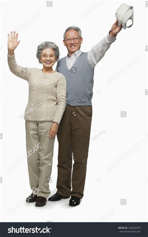 Senior Couple Waving Goodbye Stock Photo 146642570