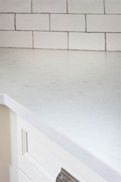 Kitchen & Bar: White Wood Cabinet With White Silestone ... Ideally suited for kitchen countertops, silestone is also excellent for bathroom vanity tops, table tops, floors and even shelving.