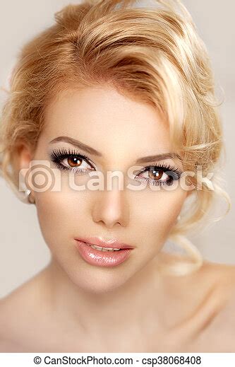 Woman Face Close Up A Pretty Young Blond Trendy With A Beauty Face