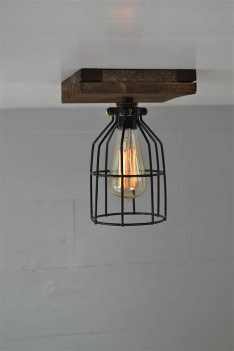 Find a large selection of rustic lighting to choose from. Farmhouse wood light fixture / single pendant light ...
