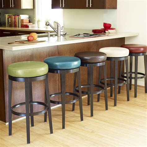 When positioning them around a kitchen island, consider making space for a seat or two on either end for a setup more similar to a dining table. Stratmoor Swivel Counterstool - Teal | Stools for kitchen ...