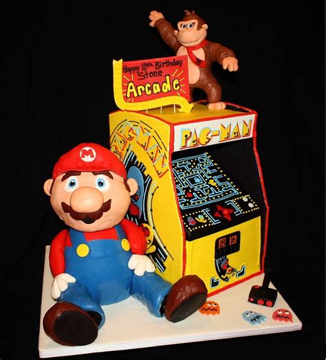 Conforman uno de los primeros géneros del sector. 80's Arcade Cake | Flickr - Photo Sharing!