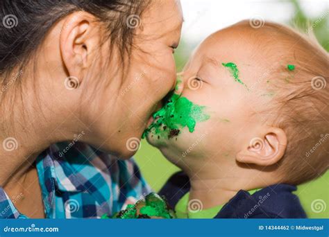 Mom And Son With Kiss And Cake Stock Photo Image Of Colours Focus 14344462