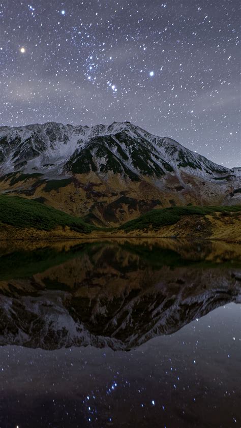 Download Wallpaper 2160x3840 Mountains Lake Reflection Stars Night