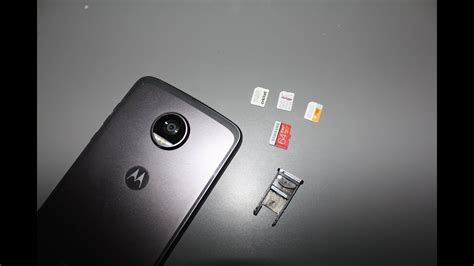 Insert and remove sim and sd cards replace sim or sd card. How to remove and install SIM Card & Memory card Motorola ...