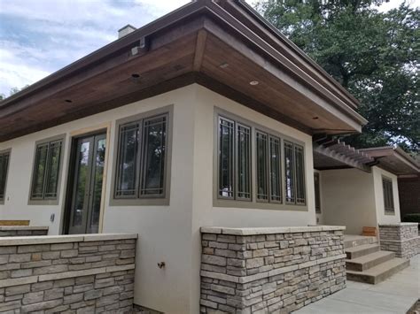 Many people are choosing to go with homeowners who have needed to replace eifs on their homes are also turning to stone veneer and other materials like hardie board and stucco. Ritter House remodel exterior stucco stone window closeup ...