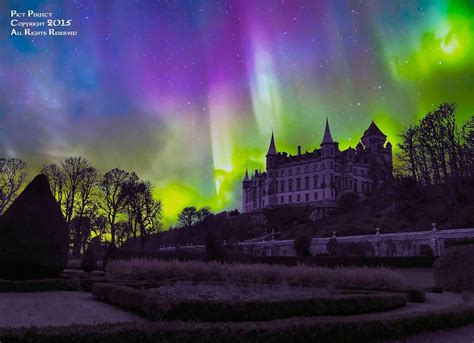 Dunrobin Castle Golspie Scotland With Stunning Curtain Of Aurora