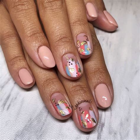 Instead, gently file off the top clear coat — no need to file deep into the color soak 1/2 a cotton ball in pure acetone and secure the cotton ball against your nail with a small strip of aluminum foil wrapped around your finger tip. How gorgeous are these gold foil nails! 😍 done for the ...