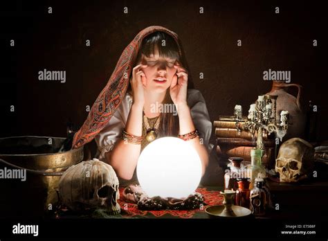 Diviner Predicting The Future With A Crystal Ball Stock Photo Alamy