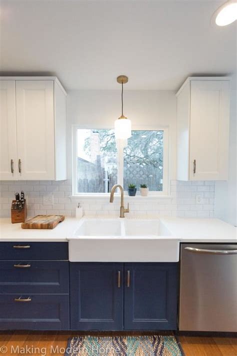 Blue provides a needed contrast for stark white. Budget Friendly Navy, White, and Brass Kitchen | Blue ...