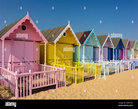 Pastel Coloured Beach Huts Mersea Island Essex Uk Stock Photo Alamy