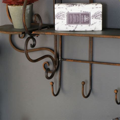 In the upper part of the cabinet there is a shelf that is divided into two parts, for storage of drugs or spices. Rustic Metal Industrial Wall Mountable Shelves with Hooks ...