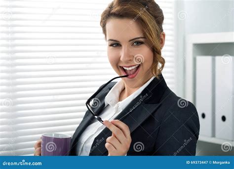 Portrait Of Beautiful Smiling Businesswoman Put Glasses In Mouth Stock Image Image Of Consult