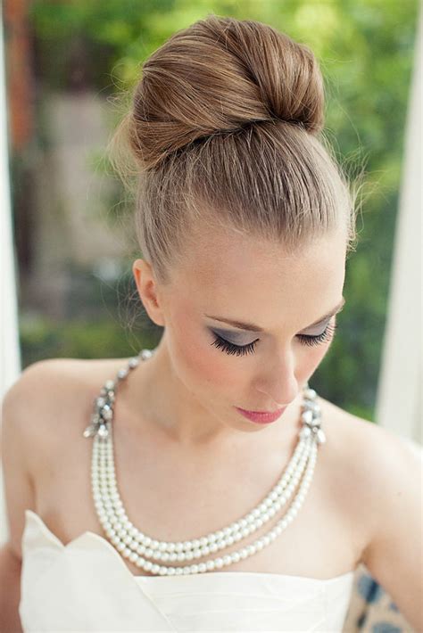 Gorgeous braid with high bun hairstyle. 20 Wedding Hairstyles with Bun Ideas - Wohh Wedding