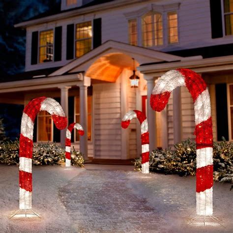 Find cool christmas decorations to make from candy canes, peppermint candy recipes, fun candy cane however, they never eat them and i always wind up throwing them away. Tis Your Season | 4 Ft Lighted 3D Tinsel Candy Cane ...