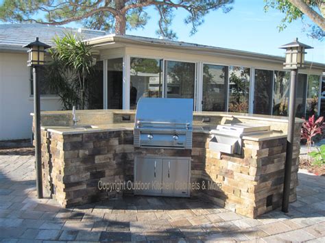 Since this is the focus of the design, it is common for the rest of the kitchen to be built around it. Outdoor Kitchen Photo Gallery | Outdoor Kitchen Cabinets ...