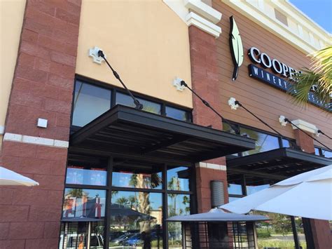 The perforated steel meets solid steel for an entry canopy. 3 Ways a Commercial Canopy can Bring Business to Your Bar ...