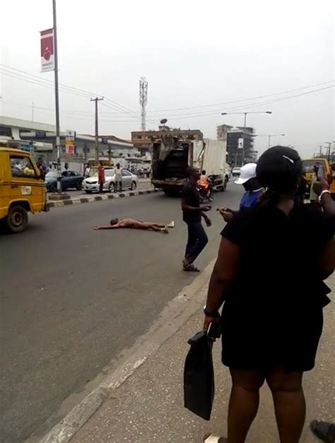 Man Rushes Out From A Bank In Lagos Strips Himself Unclad Photos Video Crime Nigeria
