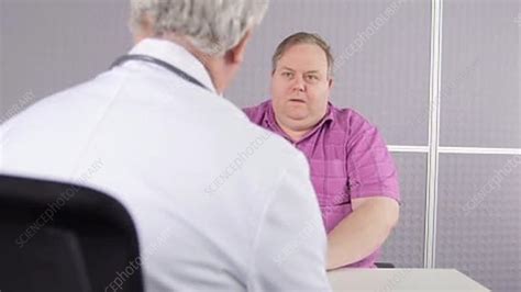 doctor consulting with obese patient stock video clip k003 8128 science photo library