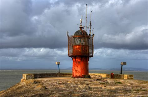 Tourists can also enjoy so much more including its monuments. HEYSHAM HARBOUR LIGHTHOUSE, HEYSHAM, LANCASHIRE, ENGLAND ...