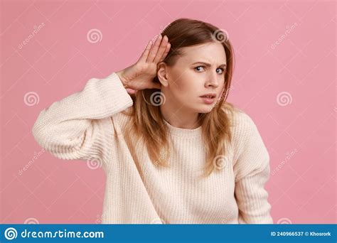 Woman Holding Hand Near Ear Listening Carefully Having Hearing