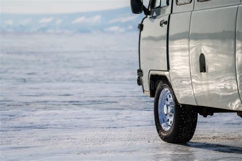 A Car With Winter Tire Parked On Ice At Frozen Lake Baikal Stock Image
