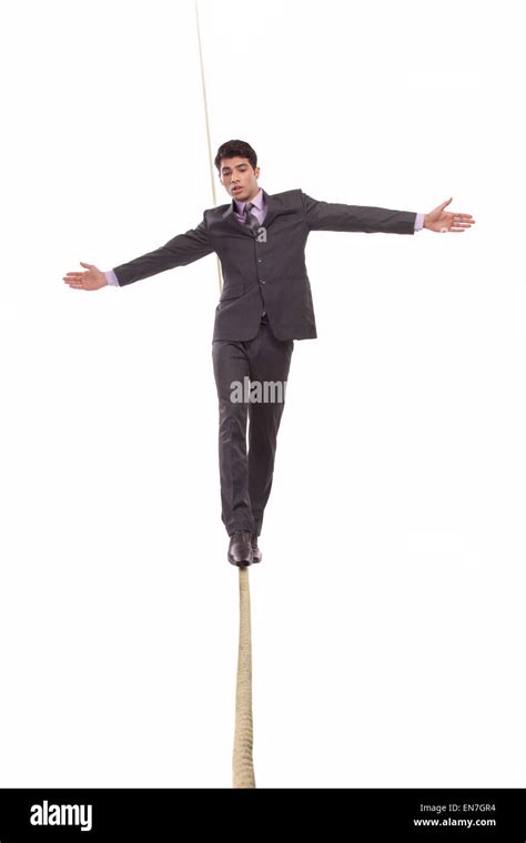 Man Balancing On Rope Hi Res Stock Photography And Images Alamy