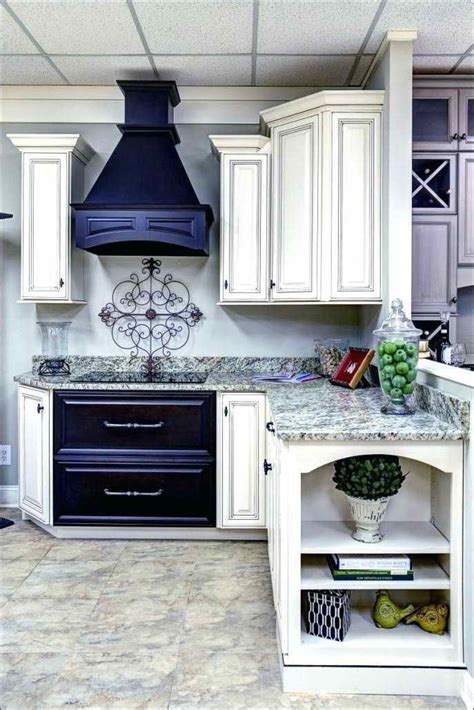 The one in the middle was a little larger, double door cabinet with an upper drawer. Deerfield Assembled Cabinets Reviews | Cabinet, Deerfield, Kitchen cabinets