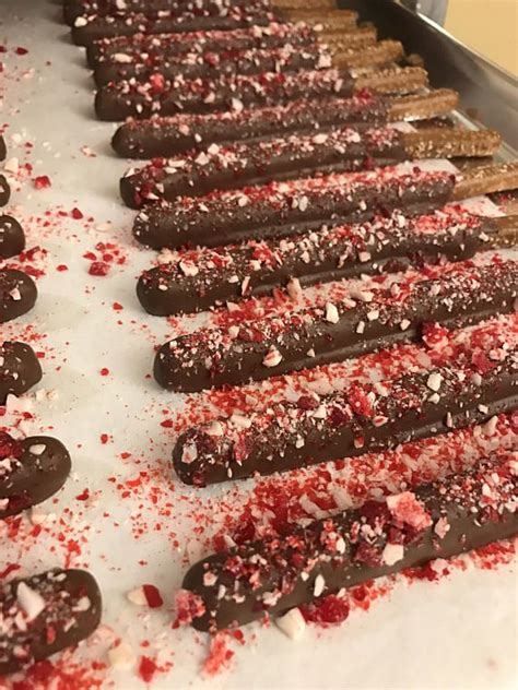 Peppermint Sprinkled Chocolate Covered Pretzel Rods Holiday Chocolate