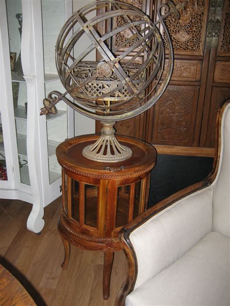 Display it on a kitchen counter or dining room credenza. wrought iron globe wine rack | Wrought, Wrought iron, Decor