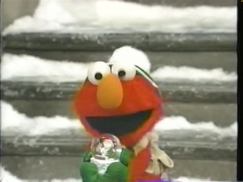 The Sesame Street Character Is Standing In Front Of Some Steps With